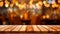 wooden table in front of abstract blurred restaurant lights background