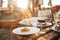 Wooden table with glassware arranged for picnic