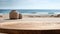 Wooden table with an intricate design on sandy beach. It is placed near water, facing ocean. There are two vases