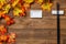 Wooden table with maple leaves