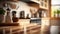 Wooden table over defocused empty kitchen. Kitchen with kettle and cup on table