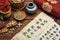 A wooden table serves as the backdrop for a collection of bowls brimming with a diverse assortment of delicious food, Traditional