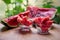 On a wooden table slices of ripe watermelon