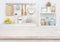 Wooden table top on blurry decorated kitchen interior furniture background