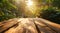 wooden table top on landscape background in blurry sunlight