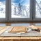 Wooden table top and white snowy winter behind the window. White wall background. Some kitchen tools on the table.