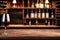 Wooden table on a wine storage cellar in a restaurant or house. Sommelier concept.