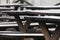 Wooden tables and benches covered with thin layer of hoarfrost