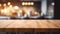 Wooden tabletop with bokeh lights kitchen background