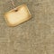 Wooden tag on sacking