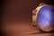 Wooden Tambourine on Brown Background