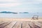 Wooden terrace and the beach view with chair stand alone in summer