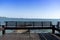 Wooden terrace with chairs on the coast overlooking the islands