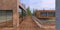 Wooden terrace on the roof of an advanced cottage designed in a modern style. Tops of coniferous trees around the building. 3d