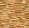 Wooden tile wall made from pieces of wood scrap