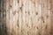 Wooden tiled wall made from pine planks.