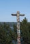 Wooden totem pole, lakeside on Whidbey Island, Washington through a scenic waterside town