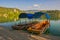 Wooden tourist boats moored to the pier on Bled lake, Slovenia