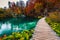 Wooden touristic footbridge over the clean lake, Plitvice lakes, Croatia