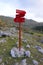 Wooden touristic sign on a trekking path in Seven Lakes Valley, Triglav National Park, Slovenia.