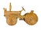 Wooden toy tractor on white isolated background