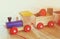 Wooden toy train over wooden table.