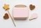 Wooden toys for girls. Wooden sweets, waffle maker and magic wand background
