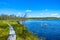 Wooden trail around the lake in a forest