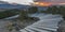 Wooden trail overlooking the mountains at sunset