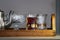 Wooden tray with a teapot and a crystal glass with tea