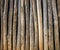 Wooden tree trunks fence