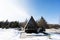 Wooden triangle country tiny cabin house with hot tub spa and suv car with roof rack in mountains. Soul weekends
