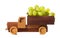 Wooden truck carries white grapes