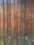 wooden  very old fence, encloses the house, background texture