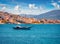 Wooden vessel on the shore of Saranda port.