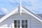 Wooden villa roof top with finial