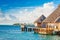 Wooden villas over water of the Indian Ocean