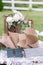 Wooden vintage Dresser, with flower decoration in garden. outdoor. selective focus