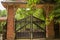 Wooden vintage rotten gates and gate