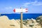 Wooden vintage sign on the beach