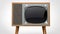 Wooden vintage TV set with silver front - closeup shot