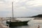 Wooden vintage vessel mooring on the pier in Roc de Sant Gaieta.