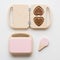 Wooden waffle makers and wooden pink play ice cream. Waldorf toys  on white background