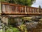 Wooden Walking Bridge Over Small Creek