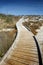 Wooden walkway by the beach at Tauparikaka Marine Reserve, , New Zealand