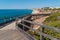 Wooden walkway to beautiful Carvoeiro beach with cliff and rock