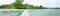 Wooden Walkway, tropical beach, clear water, Moorea, Tahiti French Polynesia. Panoramic Photo