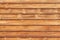 Wooden wall made of toned planks