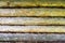 A wooden wall of untreated unpainted logs. Can be used as a background