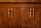 A wooden wardrobe drawer front, metal handle